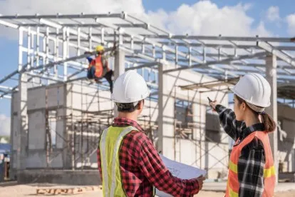 Couple reviewing building inspection report